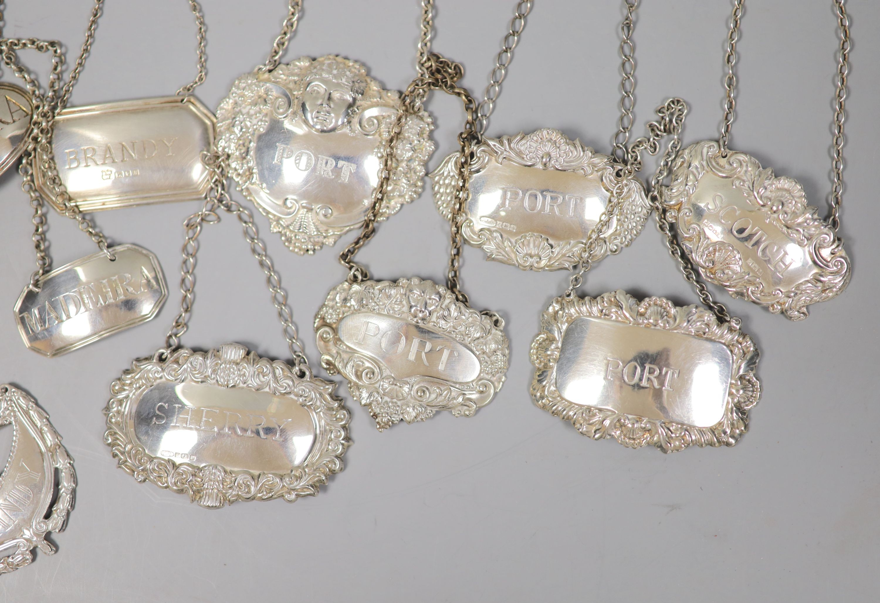 Three 19th century silver wine labels, Madeira(2) & Claret, six modern silver wine labels and three others.